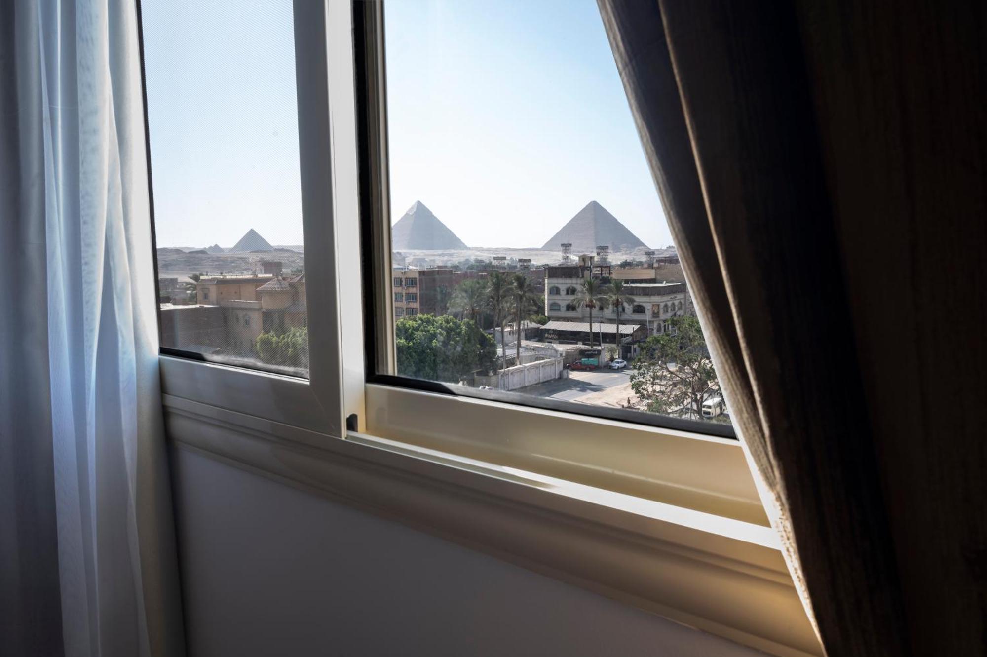 Palm Pyramids View Hotel Kafret el-Gabal Zimmer foto